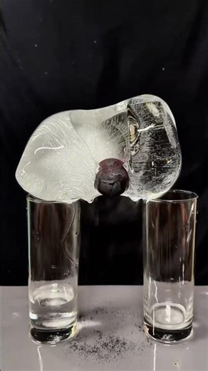 A Red Hot Iron Ball Melts Ice, Breaking Glass to Reveal Jewelry