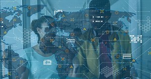 Colleagues walking corridor activating technology map overlay tracking data while reviewing folder