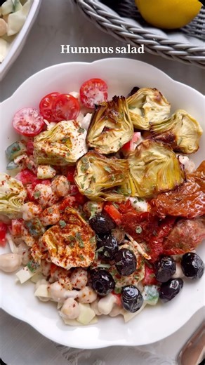 Hummus salad @christianna.nutritionist .⁣ Have you ever turned hummus into a salad dressing? If the answer is no please try it. It’s so delicious! Creamy, flavourful and really easy to make. ⁣ .⁣ For the dressing ⁣ ▪️1/3 cup humus ⁣ ▪️Juice of 1 lemon ⁣ ▪️2 tbsp olive oil ⁣ ▪️2 tbsp warm water ⁣ ▪️1 teaspoon salt ⁣ For the salad ⁣ ▪️1 jar chickpeas @boldbeanco ▪️1 cucumber⁣ ▪️1 red pepper ⁣ ▪️1/4 white cabbage ⁣ To serve ⁣ ▪️Today I added sundried tomatoes, olives and roasted artichokes. ⁣ Garni