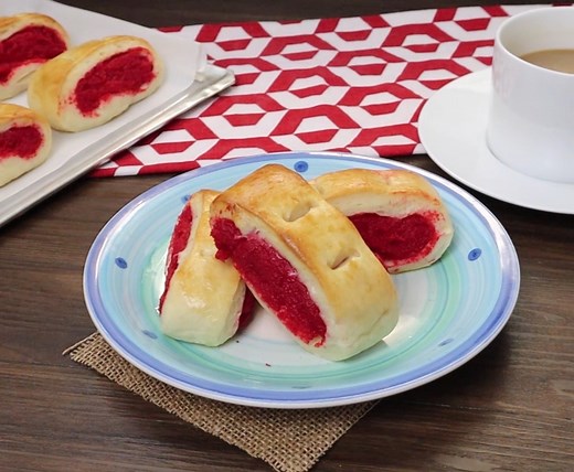 Kalihim is as pretty as it is tasty! Soft and delicious with a sweet, bright-red pudding filling, this bread, also known as Pan de Regla, Kabukiran, or Pan de Pula, makes a great breakfast or snack treat. https://www.kawalingpinoy.com/kalihim/ | Kawaling Pinoy Recipe Blog