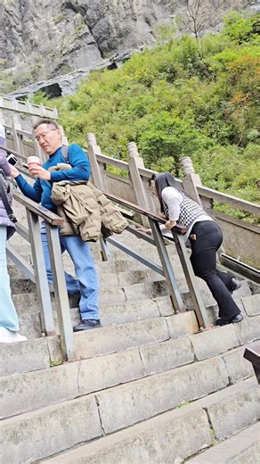Tianmen Cave "Heaven's Gate" in Tianmen Mountain National Park. Visitors can reach it by climbing 999 steps known as the "Stairway to Heaven". | Benschop Travel & Tours