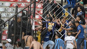 Two fans die after riot erupts during Mexican soccer game at Corregidora Stadium
