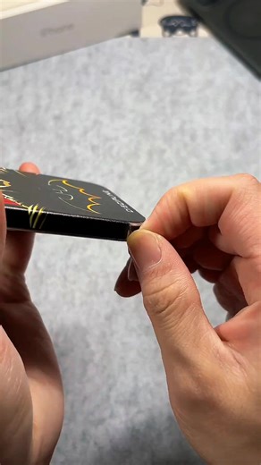 What Is This Batman Doing With iPhone?