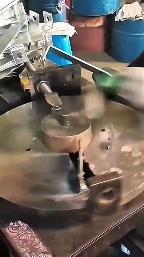 Metal strip bends—cylinder molds curve, machine guides