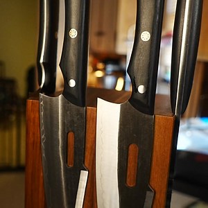 This is NOT your average kitchen knife. This is the Kaiju Series — engineered for battle in the kitchen. Mass-produced knives? They chip, dull, and bend. They crush tomatoes, shred steak, and slow you down. Kaiju knives are different. Forged using San Mai, a legendary Japanese technique once used to craft Samurai swords, each blade has: ⚔️ A hardened steel core for razor sharpness ⚔️ Protective outer layers for durability ⚔️ Balance and control chefs swear by The result? A blade that stays sharp