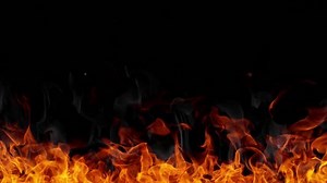 Super slow motion of fire flames isolated on black background. Filmed on high speed cinema camera at 1000 fps