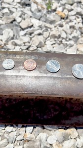 What happens if you put coins on a train track? #coins #CoinCollecting #coincollector #trains #traintracks | Blonde Okie