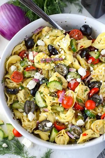 Greek Tortellini Pasta Salad: A Mediterranean Twist on a Classic "When my best friend brought this salad to our picnic, it quickly became the star of the show—who knew tortellini could dance so beautifully with feta and olives?" This Greek Tortellini Pasta Salad is a vibrant celebration of flavors that transforms a simple meal into a Mediterranean getaway. Ingredients 12 oz cheese tortellini 1 cup cherry tomatoes, halved ¾ cup feta cheese, crumbled ½ cup Kalamata olives, pitted and sliced Reacip