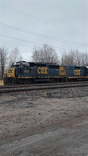 CSX Road slug runs light through a crossing, nice horn! 31626 #locomotive #shorts #slug #train