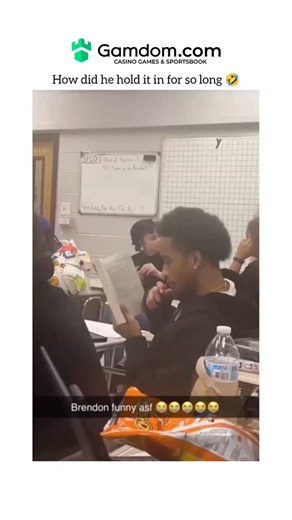 guffvibes on Instagram: "This video is a short, humorous clip from a classroom setting that has gone viral for its comedic timing. Here is a breakdown of what happens: Video Overview The video features a student named Brendon who is sitting at his desk, seemingly focused on reading a book. The caption on the screen says, "How did he hold it in for so long?" and "Brendon funny asf," accompanied by several laughing emojis. Key Moments The Setup: Brendon is holding a book and appears to be reading