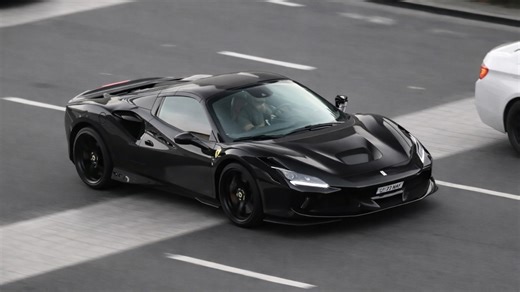 Black Ferrari F8 seen cruising through the city