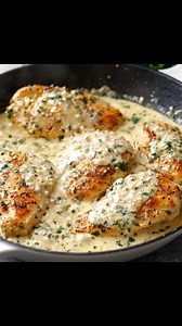 Juicy, pan-seared chicken breasts smothered in a rich, garlicky cream sauce—this dinner feels fancy but is super easy and budget-friendly. Perfect for weeknights when you want something cozy and satisfying! | Recipe Stories