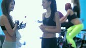 Great fitness workout in the gym. Two friends are athletes meet each...
