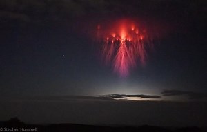 This scary alien-like 'red jellyfish' was captured hovering in the sky