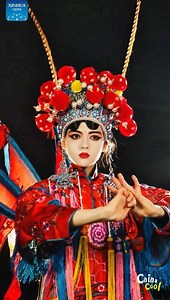 14K views · 62 reactions | Adorned in traditional costume and makeup, American girl Lile delves into the captivating charm of Peking Opera | Xinhua Culture&Travel | Facebook