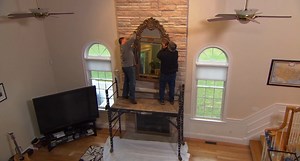 71K views · 1.3K reactions | On #AskTOH, general contractor Tom Silva helps a homeowner hang a large mirror on the stone chimney above his fireplace  | This Old House | Facebook