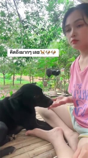 Wholesome Moments: Farmer Girl Plays with Her Dog