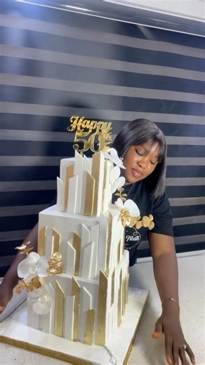 XENA TREATS on Instagram: "We delivered this beautiful 3 tiers cake for 50th birthday 🥰 Need cake ? We are just a dm away 💯 kindly send a dm or click on the link in our bio to book a cake with us . . . #explore #cakesinibadan💖💖 #reels #ibadanbakers #reelsinstagram #cakeidea #birthdaycake #reels #50thbirthdaycake"