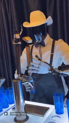 The Tesla Optimus bot serving drinks at the Tesla 'We, Robot' Event. Video Credit: Tesla #tesla #teslabot #robots #engineering #technology | Wevolver.com
