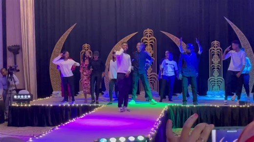 Coordinated Dance Routine on a Vibrant Stage