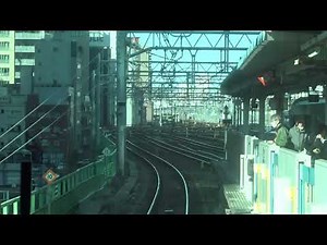 Front view of the E233 series rapid train running between Kanda Station, Akihabara Station, and O...