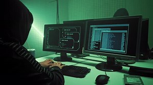 Young Hacktivist Organizes Malware Attack on Global Scale.