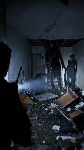 Officer Chases Suspect Into Abandoned House - But He's Not Alone