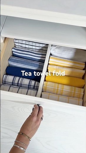Quick and easy way to organize tea towels xx #kitchen #organization #home