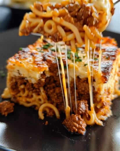 15K views · 40 reactions | Rich, creamy, and full of Mediterranean flavor!  This Pastitsio (Greek Lasagna) layers spiced ground beef, tender pasta, and a velvety béchamel sauce — baked to golden perfection for the ultimate Greek comfort dish!  .............. Full Recipe in Coʍmеոτ  | Donerecipe by Sarah | Facebook