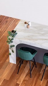 The statement island bench, completely clad in Porcelain Mirabel, is the focal point of this modern kitchen. In a honed finish and featuring the soft translucency of alabaster, its ivory base features bold striations in charcoal, grey and copper. Gentle hues of ivory and washed clay add a sense of movement and finesse. Mirabel has also been used on rear workbench and splashback. Project Design &Installation: Retreat Design @retreat_design Photographer: Silvertone Photography | Caesarstone Austra