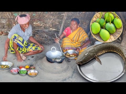 SNAKE HEAD FISH with RAW MANGO cooking for lunch menu by santali old couple