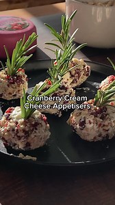 The perfect festive appetiser!🧀Create these cream cheese balls coated in our Cranberry Cheddar, nuts and dried cranberries and topped with a sprig of rosemary.😍Perfect to serve at Christmas!🎄#chucklingcheese #notjustcheese #cheesefood #appitizer #creamcheese #christmasfood | The Chuckling Cheese Company