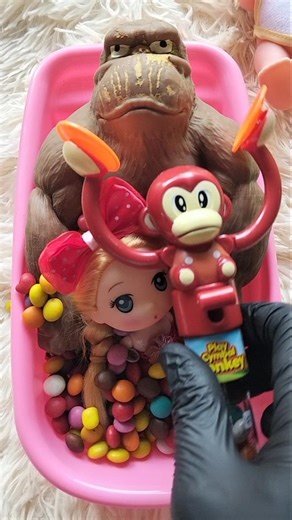 ASMR popular candies, rainbow lollipops, colorful sweets, unpacking chocolate and eating sounds