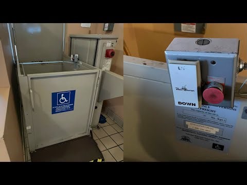 Sketchy National Wheel-O-Vator Screw Drive Wheelchair Lift @ Steinbeck Plaza, Monterey, CA