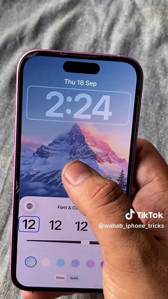 Resize Your iPhone Lock Screen Clock with iOS 26