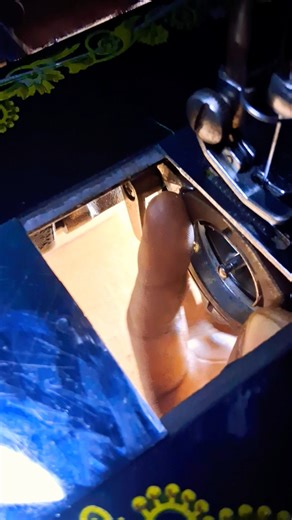 removing and replacing open shuttle race of sewing machine