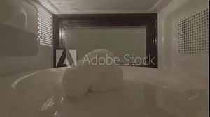 Science project: Soap contains water, therefore it expands inside the microwave oven and forms bubbles, timelapse, flat colors