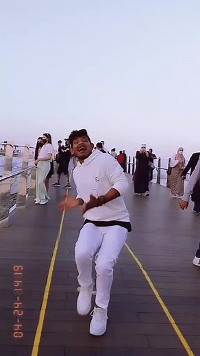 Twilight Dance Performance on a Boardwalk