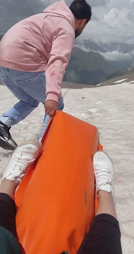 Sledding Fun on Snowy Slopes: A Winter Adventure