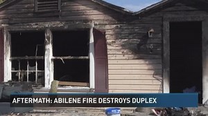 Fire aftermath: duplex burned and man injured