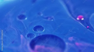 Blur bubbles. Oil emulsion. Defocused blue pink color droplets floating acrylic texture paint water blend swirl motion abstract art background.