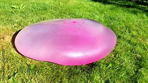Bubble Wubble ball filled with water, slow motion play Bubble Wubble, wubble, ball, water ball, large, water, fun, for kids, slow motion, water ball huge, summer, play