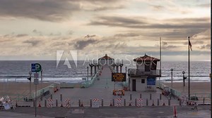 LED Sign Displaying Strand, Bike Path, And Beach Closed At Manhattan Beach Pier Due To COVID-19 In California. - timelapse