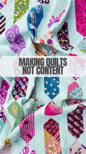 Quilts, Patterns, Tutorials on Instagram: "I make a lot of quilts. I love color, scraps, and figuring it out as I go. Nothing is perfect, my sewing room is a mess, and my quilt photo assistant is a goofball. If that sounds like your kind of quilting, stick around. Share this with someone who would rather be quilting than curating  #theoriquilt #modernquilting #scrapquilt #honestcraftroom #kitchentablequilting #quiltsinthewild"