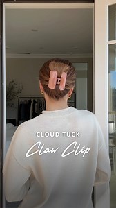 173K views · 271 reactions | ☁️ Cloud Tuck Claw Clip ☁️ Gather your hair into a ponytail and secure with a hair tie. On the final pull through, stop halfway to create a mini bun. Create an opening just above the hair tie and flip the mini bun inside. Collect the remaining tail and fold it in half toward your scalp, tucking the ends down. Secure with a chunky claw clip for a cute, cozy winter hairstyle! #hair #hairtutorial #updo #hairstyles | Nichole Ciotti | Facebook