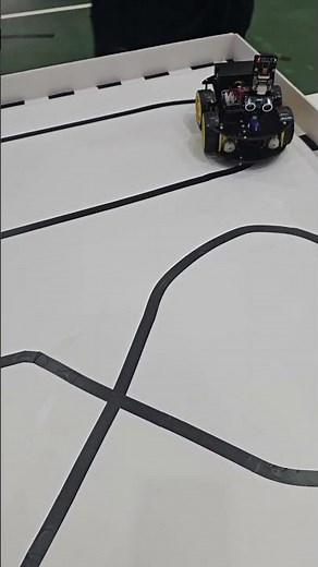 A car designed to follow a perimeter, using sensors.School based project.