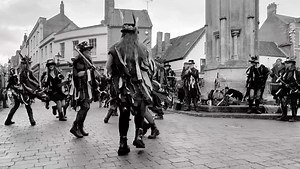 Wild Moon Morris dodging the rain clouds to dance for Samhain, on Glastonbury Market Cross. #normalforglastonbury #glastonburytown #morrisdancers #samhain #halloween | Normal For Glastonbury
