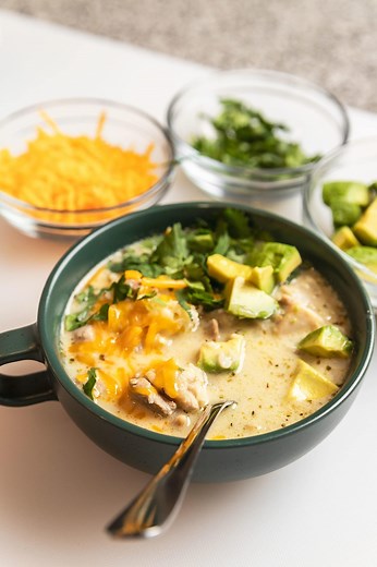This easy keto white chicken chili is healthy, low carb, and keto friendly! We use cauliflower rice instead of beans and there is no flour or cornstarch. I give instructions for the stove top, crockpot, and for freezing✅Recipe:https://jenniferbanz.com/creamy-white-chicken-chili-crockpot-or-stove-top | Low Carb Recipes with Jennifer
