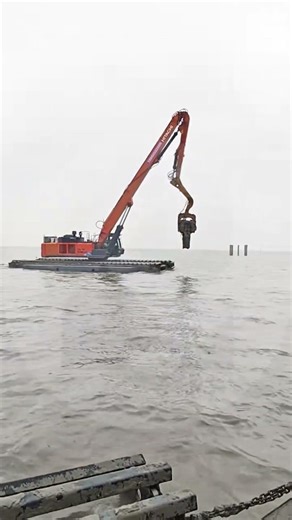 Pontoons Turn an Excavator into an Offshore Piling Machine
