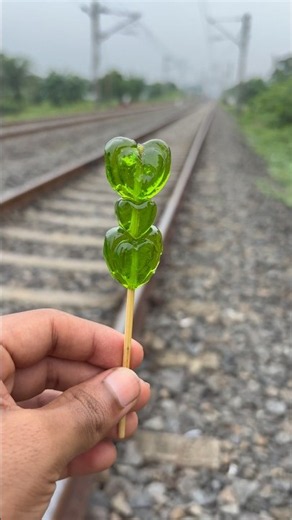 Green heart 💚 candy 🍭 vs train 🚊 what 😱 happened next..? #shorts #train #viral